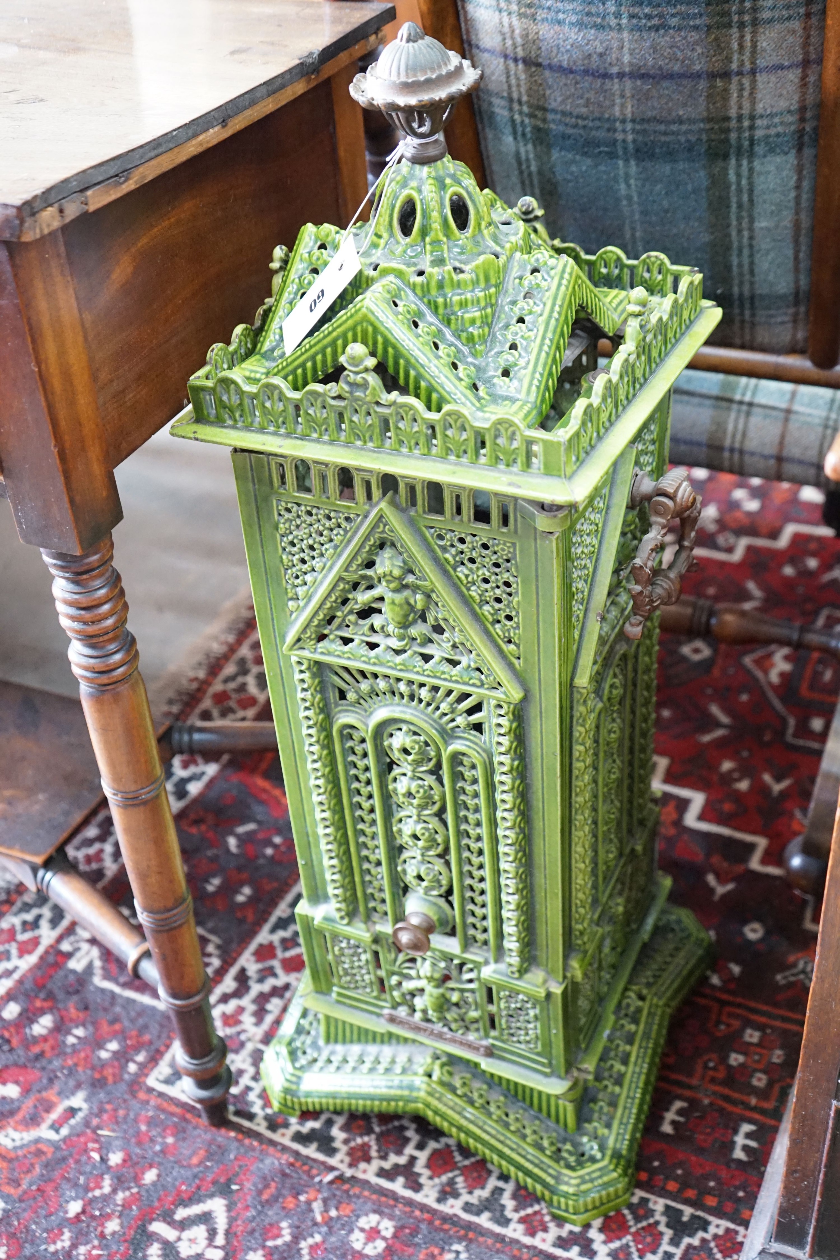 A late 19th century French enamelled conservatory heater, height 80cm